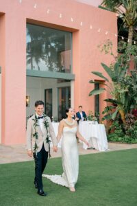 bride and groom entering reception at their Royal Hawaiian wedding